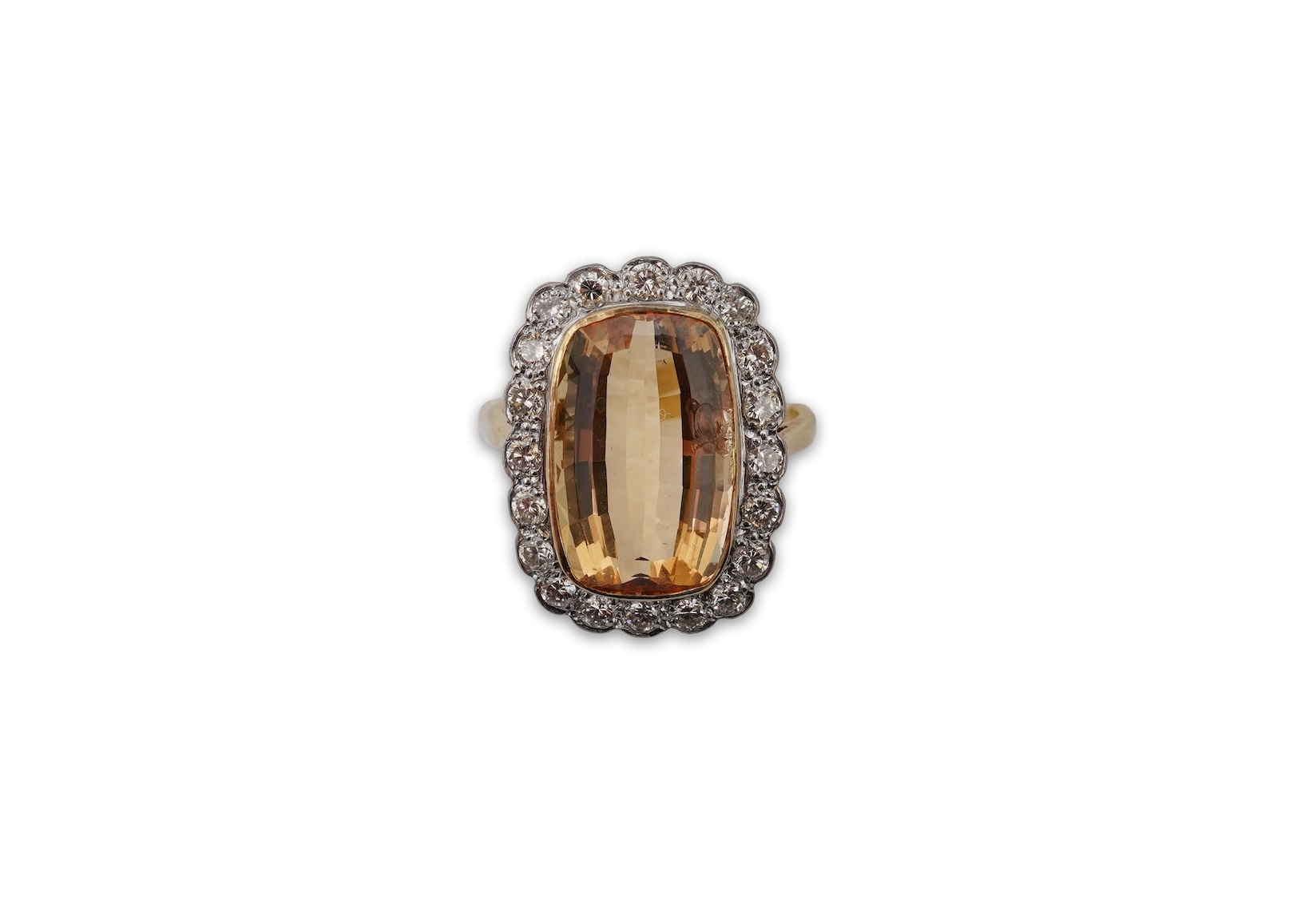 A topaz and diamond cluster ring